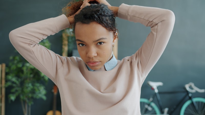woman with natural curly hair showing hair texture