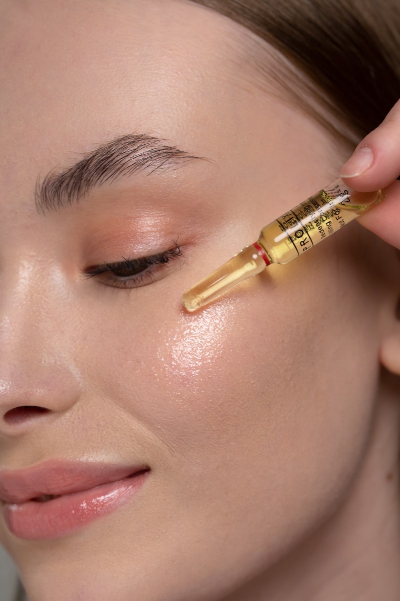 vitamin C serum being applied